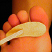 Cloth hammer toe crest pad on foot